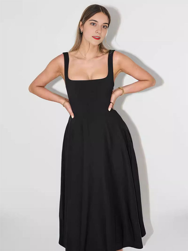Robe midi minimaliste à bretelles larges de couleur unie